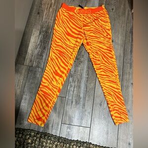 Ethika Women Tiger Fire Leggings in yellow and orange zebra print